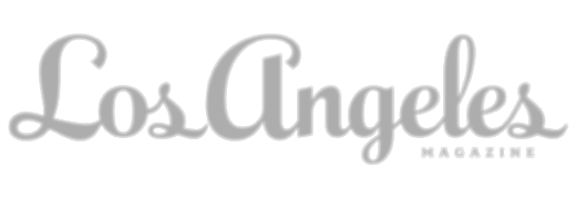 Los Angeles Magazine logo in grey текст.